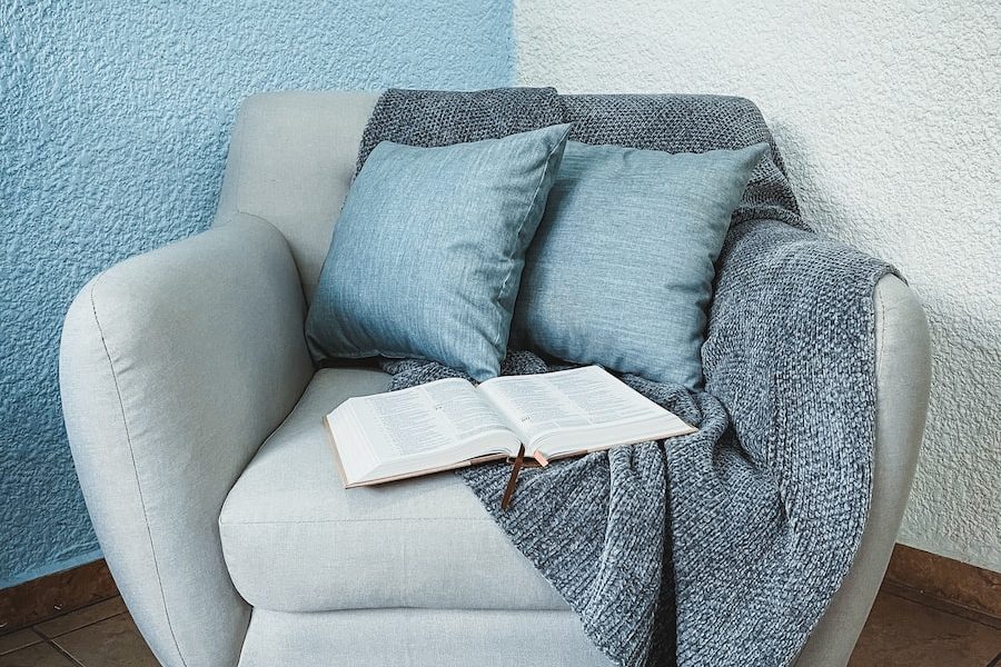 gray sofa with throw pillows