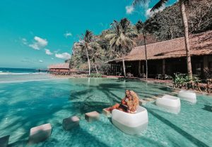 fat fire woman in swimming pool during daytime